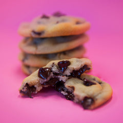Gourmet Chocolate Chip Cookies - Hand Crafted Since 1955 - Closeup on pink background