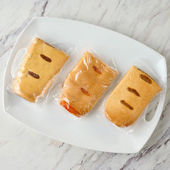Kolachi Roll Sampler - Walnut, Apricot, Pecan - sliced on board