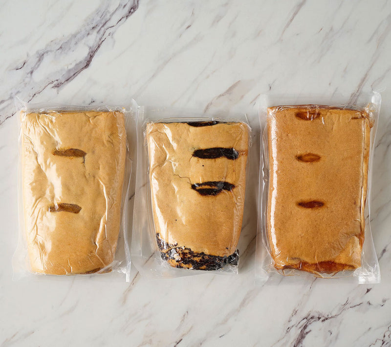 Kolachi Roll Sampler - Apple Cinnamon Jam, Walnut, Poppy Seed - Served Sliced on a Stone Cutting Board